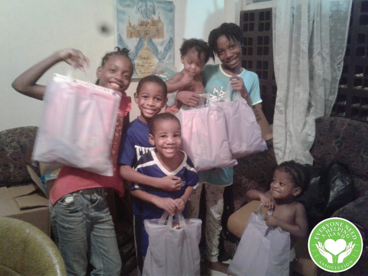 Children Receiving toys sponsored by the One Stop Shop, Online