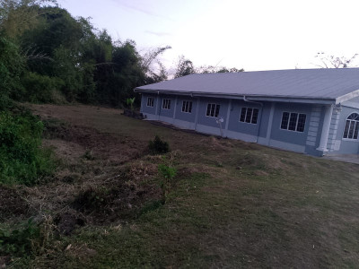 ASSISTANCE TO ERECT A WALL NEAR THE GUARACARA RIVER THAT IS SITUATED AT THE CHURCH COMPOUND